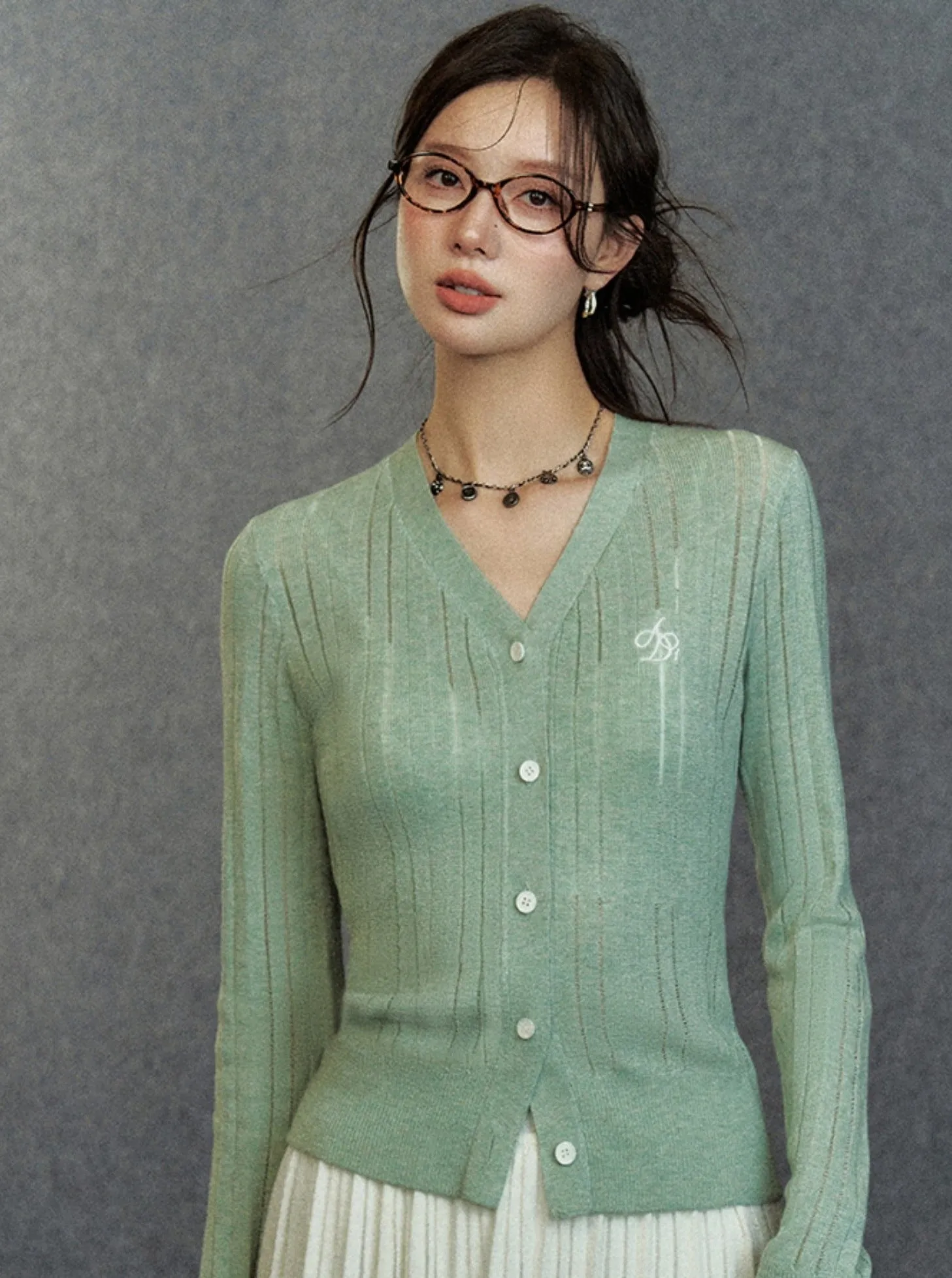 Elegant Ribbed Cardigan: Classic V-Neck with Signature Embroidery