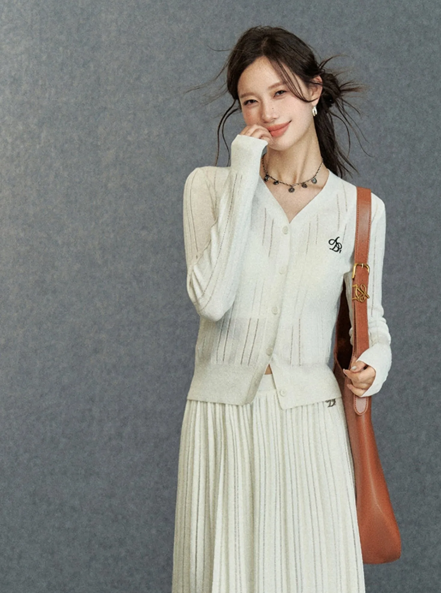 Elegant Ribbed Cardigan: Classic V-Neck with Signature Embroidery