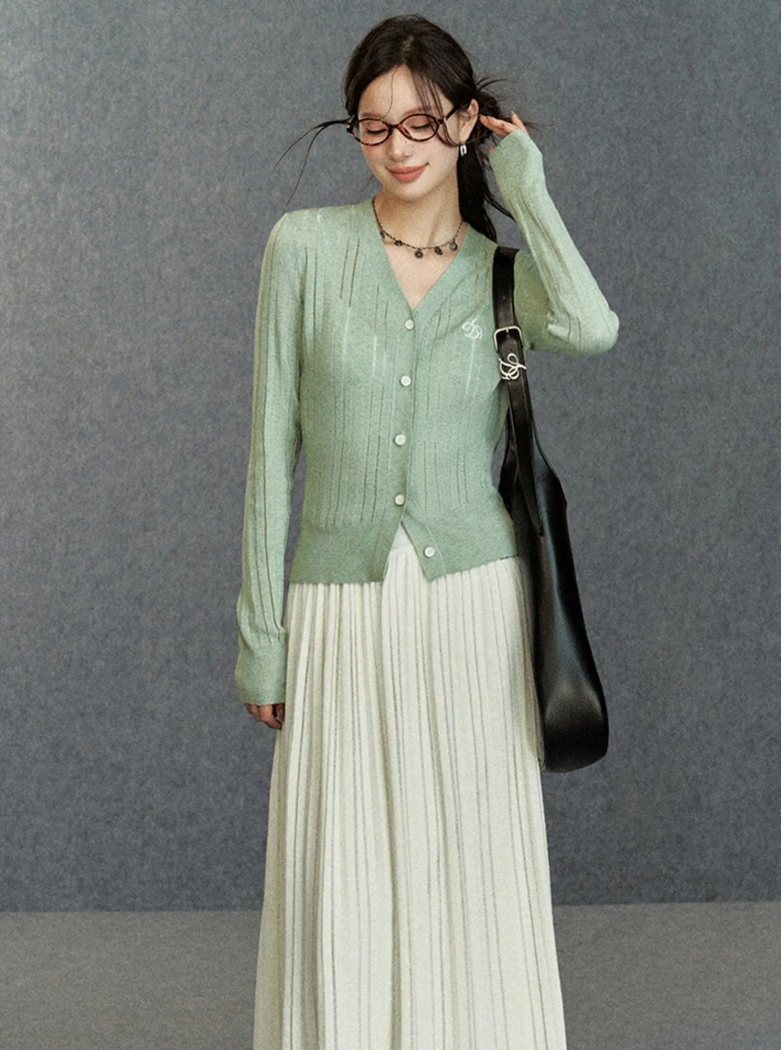 Elegant Ribbed Cardigan: Classic V-Neck with Signature Embroidery