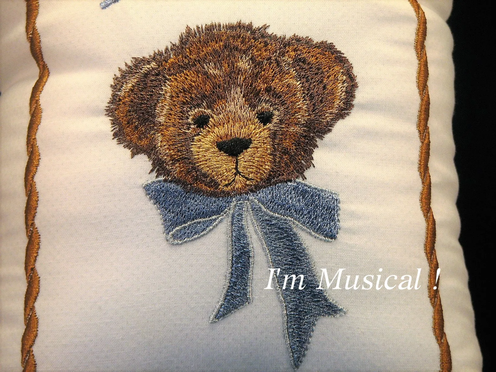 Teddy Bear Head with Bow Musical Baby Pillow -- Personalized Embroidered Baby Keepsake